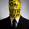6 Words That will Hurt your Ability to Lead | Business man with caution tape on his face | I'll be honest with you